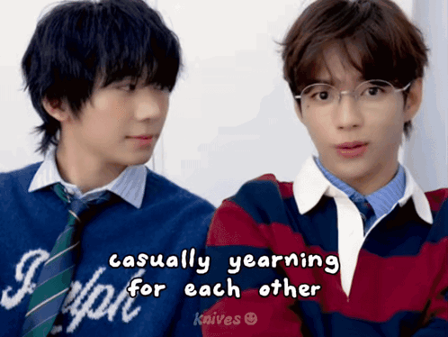 Two Boys in Sweaters and Ties Casually Yearning for Each Other