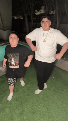 Two Boys One Wearing Kobe Bryant Shirt