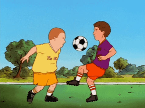 Two Boys Playing Soccer Yellow Shirt Saying The World GIF