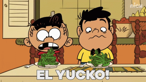 Two Boys Sitting at Table with Green Beans