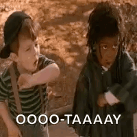 Two Boys Standing Next To Each Other GIF