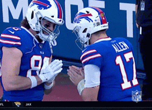 Two Buffalo Bills Football Players Are Clapping Hands GIF