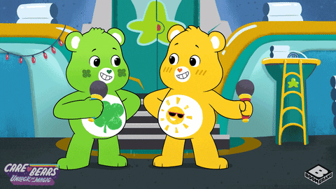 Two Care Bears Holding Microphones