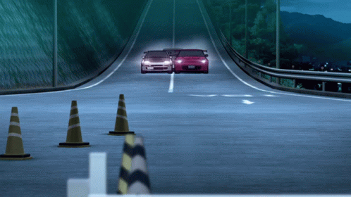two cars are driving down a highway and one has a license plate that says ' ssr ' on it