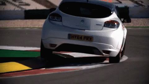 Two Cars Racing on Track with ATD Sign