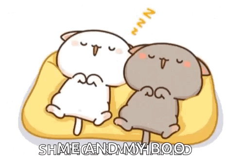 Two Cartoon Cats Are Sleeping On A Yellow Blanket . GIF