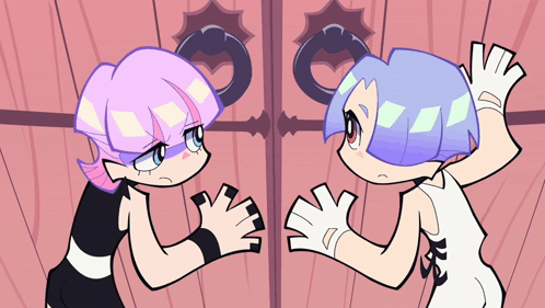 Two Cartoon Characters Are Standing Next To Each Other And One Of Them Has The Letter K On Her Shirt GIF