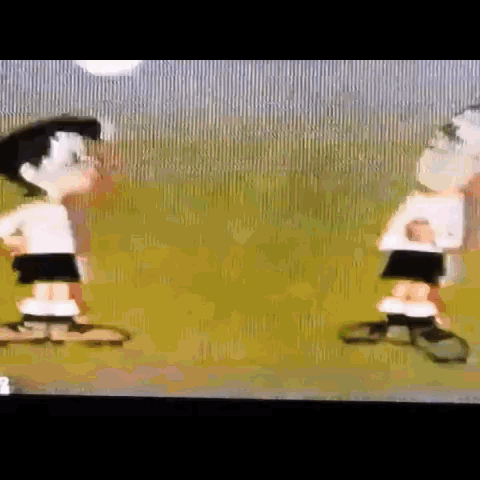 Two Cartoon Characters Are Standing Next To Each Other In A Field . GIF