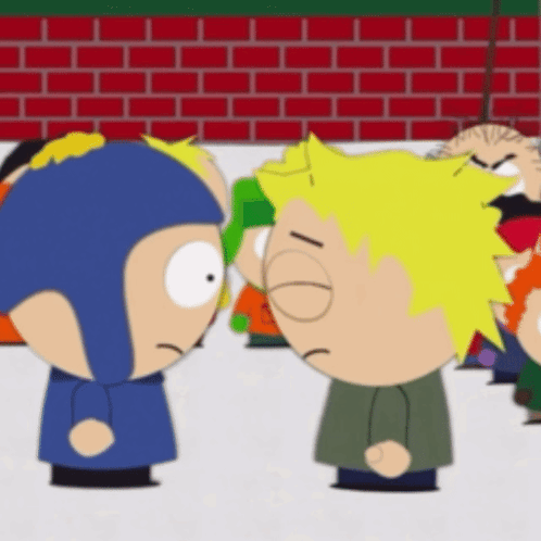 Two Cartoon Characters in Front of Red Brick Wall