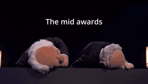 Two Cartoon Characters Laying Down Mid Awards GIF
