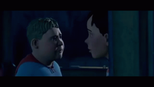 Two Cartoon Characters Looking At Each Other In Dark GIF