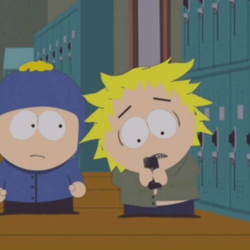 Two Cartoon Characters One Holding Cell Phone