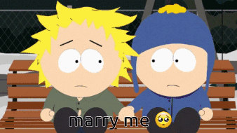 Two Cartoon Characters Sitting on Bench Saying Marry Me