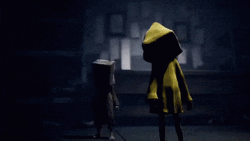 Two Cartoon Characters Standing In Dark GIF
