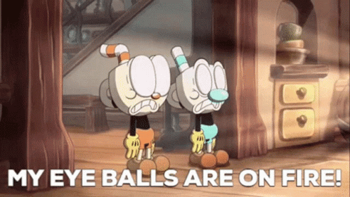 Two Cartoon Characters Standing Next To Each Other With The Words " My Eye Balls Are On Fire " Above Them GIF
