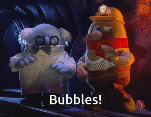 Two Cartoon Characters With Bubbles