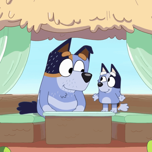 Two Cartoon Dogs Are Sitting At A Table And One Has A Beard GIF