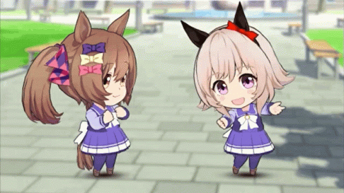 Two Cartoon Girls Standing Together