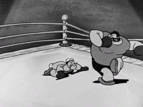 Two Cartoon Men Boxing in Black and White