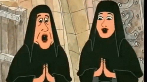 Two Cartoon Nuns Standing With Hands Together