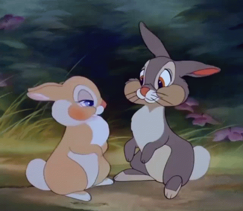 Two Cartoon Rabbits Smiling