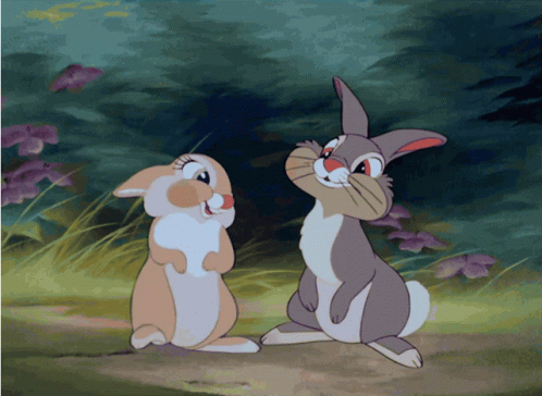 Two Cartoon Rabbits Smiling
