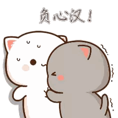 Two Cats Standing Next to Each Other