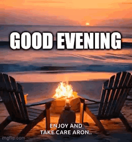 Two Chairs Next to Fire Pit on Beach