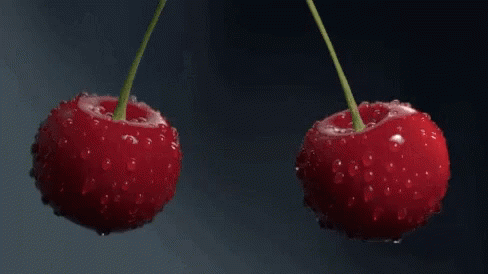 Two Cherries Splashed in Water