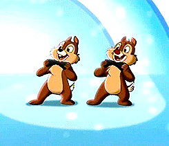 Two Chipmunks Standing on Ice