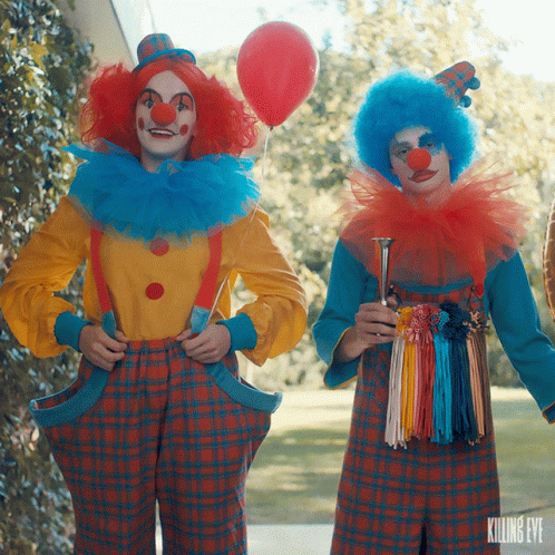Two Clowns Are Standing Next To Each Other With Killing Eye Written On The Bottom Right GIF