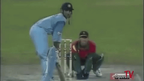 Two Cricket Players Playing on Field With Sports TV Logo