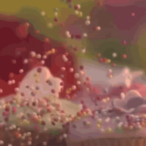 Two Cupcakes With Pink Frosting