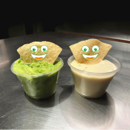 Two Cups of Guacamole and Queso with Smiley Faces