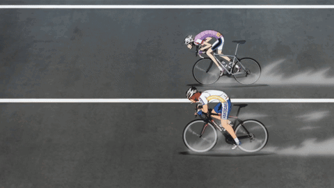 Two Cyclists One Wearing Tokyo Jersey