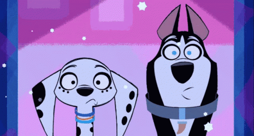 Two Dalmatian Dogs Standing Together