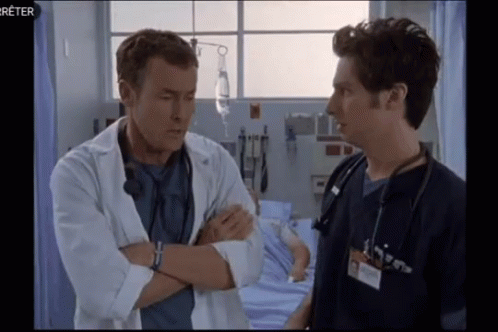 Two Doctors Talking in Hospital