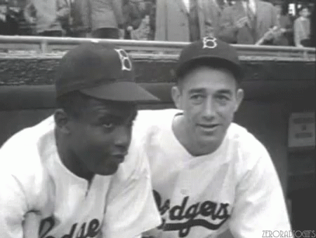 Two Dodgers Players Sitting Together in Dugout