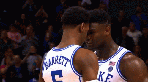 Two Duke Basketball Players Barrett And Zion Williamson Are Looking At Each Other GIF