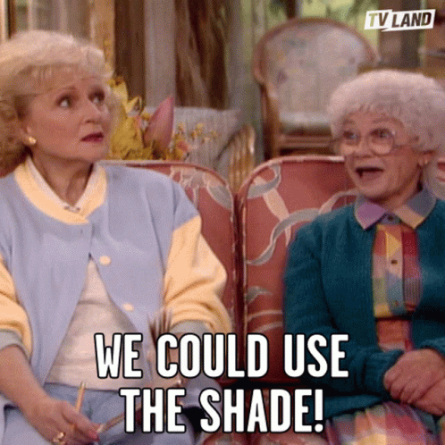 Two Elderly Women Sitting on Couch Saying We Could Use the Shade
