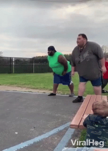 Two Fat Men Playing Basketball