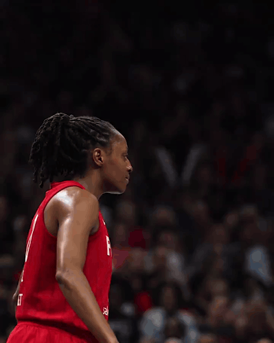 Two Female Basketball Players Wearing Red Jerseys One With The Number 8 On It GIF