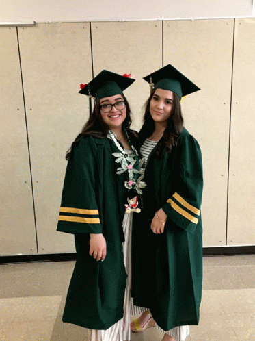 Two Female Graduates Posing