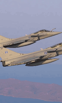 Two Fighter Jets Are Flying Side By Side With One Having The Number 1 On The Tail GIF