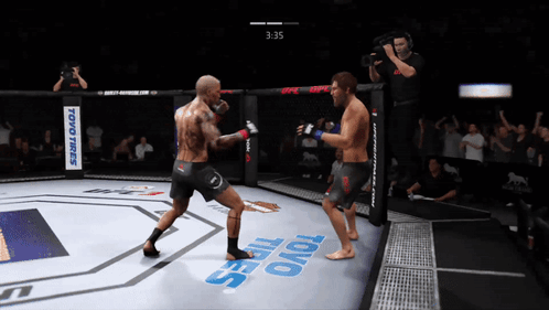 Two Fighters In Boxing Ring With Toyo Tires Sign GIF