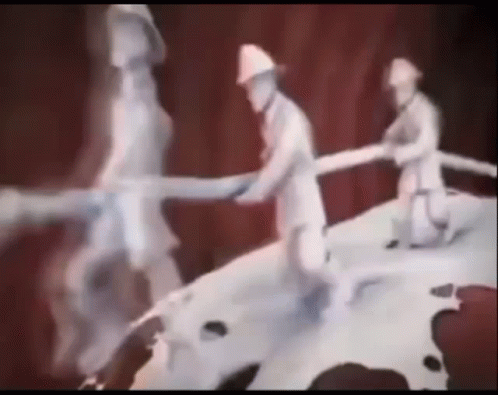 Two Firefighters Holding Hose On Mountain GIF