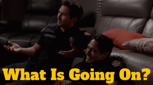 Two Firefighters Sitting On A Couch With The Words What Is Going On GIF