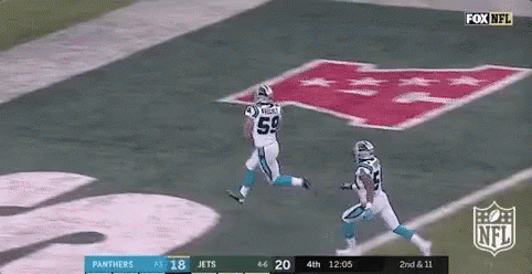 Two Football Players Are Running On A Field With A Fox Nfl Logo In The Background . GIF
