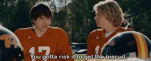 Two Football Players Are Talking To Each Other And One Of Them Says You Gotta Risk It To Get The Biscuit GIF