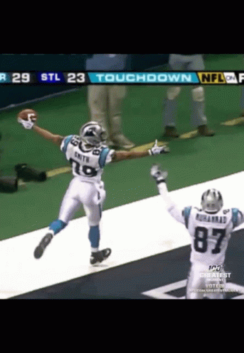 Two Football Players Celebrate A Touchdown During A Game Between The Panthers And The Jets GIF